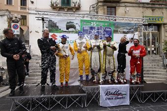 Podium: Lorenzo Codeca, Bruno Fedullo (Suzuki New Grand Vitara 3.6 T1 11 #12, Emmetre Racing), race winner, Tomasz Komormicki, Artur Kotodziej (Mitsubishi L 200 EVO T1 11 #22, G1 Racing) 2nd position, and Andrea Mayer, Roberto Musi (Danisi Light T3 35 #21) 3rd position, CAMPIONATO ITALIANO CROSS COUNTRY E SSV